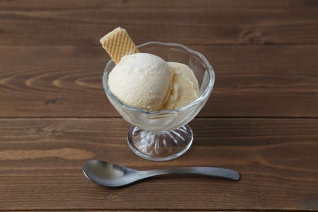 Ice cream with wafer on dessert glass