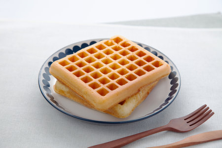 waffles pancakes on plate on tableの写真素材