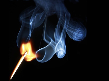 matchstick lighted, burning match stickの写真素材