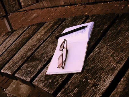 glasses on bookの写真素材