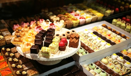 bakery vitrine with sweet assortment の写真素材