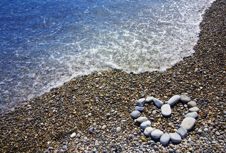 symbol of heart on beachの写真素材
