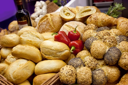 bread background with wine bottleの写真素材