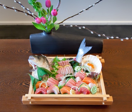 japanese raw seafood selection on wooden trayの写真素材