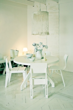 interior with stylish white dinner tableの写真素材