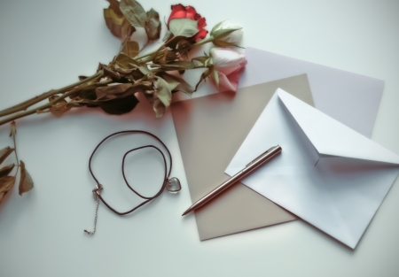 background of  card of memory love with dry rosesの写真素材