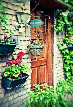 cottage door with spring  flowerの写真素材