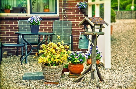 old vintage dutch village with spring flowersの写真素材