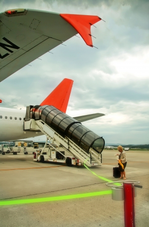 passenger on air field by planeのeditorial素材