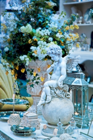 home decoration shop with angel sculpture の写真素材