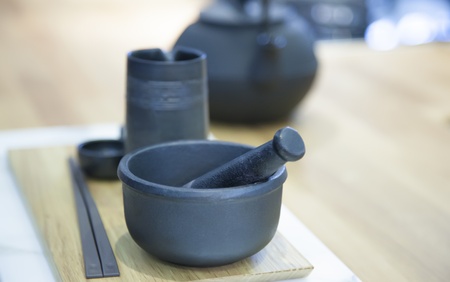 kitchen table with ceramic potsの写真素材