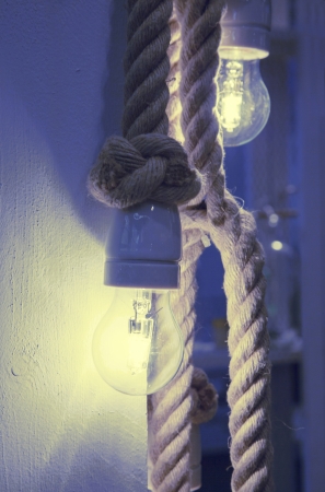 conceptual image of lamps and ropesの写真素材