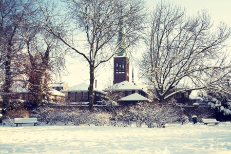 church silhouettes in winter dutch villageの写真素材