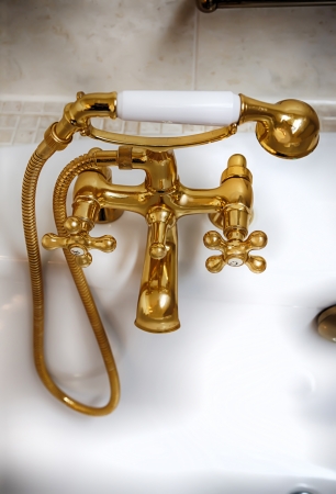 detail of classic bedroom with golden faucet の写真素材