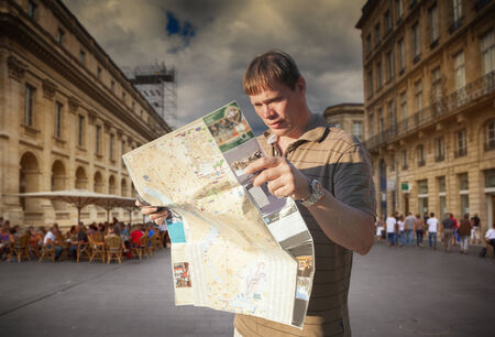 tourist with map in Bordeaux cityの写真素材