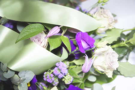 flower arrangement  for funeral with satin ribbonsの写真素材