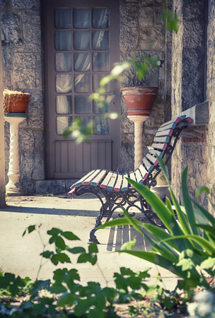 bench in abandoned spring home gardenの写真素材