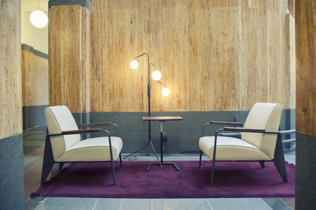 two chairs in hall of office building の写真素材