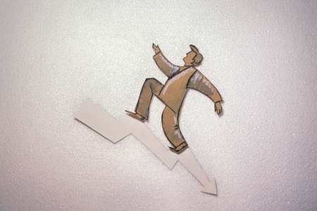 Conceptual business illustration. Cut out cardboard silhouette of people or signs on different backgroundの写真素材