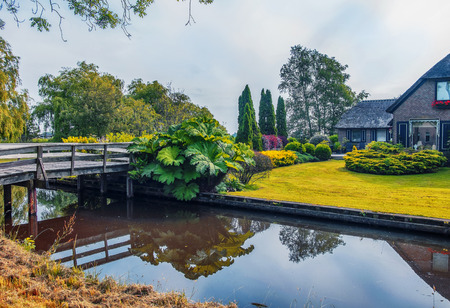 summer in old dutch village, Giethoorn, Overijssel province in the Netherlandsの写真素材
