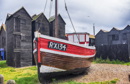 A fishing boat beside the old fishermen's sail lofts in Hastings. 30th of June 2016 in Hastings, Englandのeditorial素材