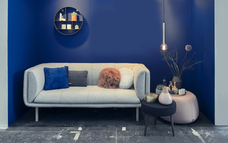 detail of home interior furniture and blue wallの写真素材