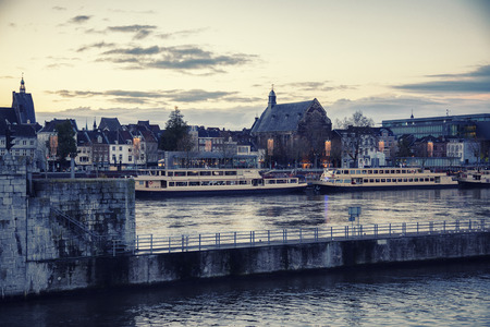 Maastricht, evening view from Wilhelmina brug over river Maasの写真素材