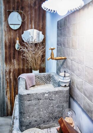 detail of toilet room with stylish washstand in county retro styleの写真素材