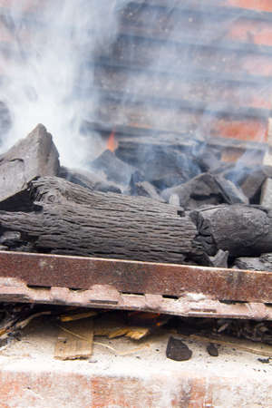 bonfire of coal, fire, smokeの写真素材