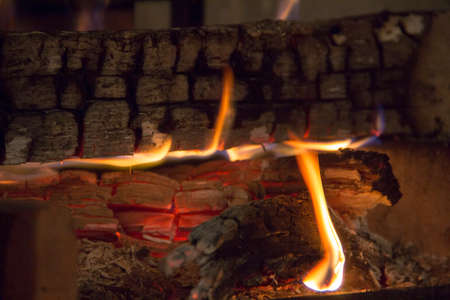 bonfire of coal, fire, smokeの写真素材