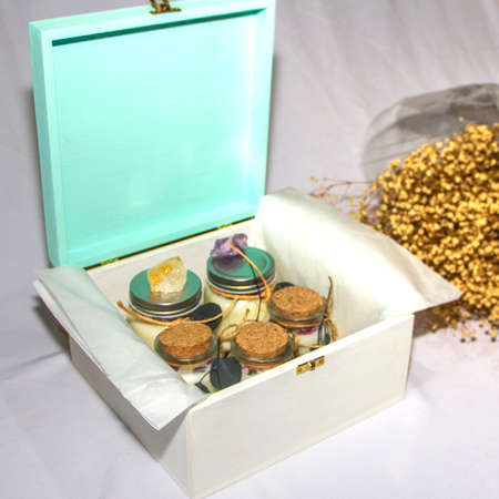 scented candles in glass jar with decorative elementsの写真素材