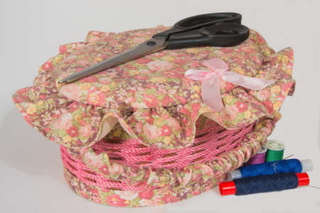 The casket for sewing accessories sheathed by a beautiful matterの写真素材