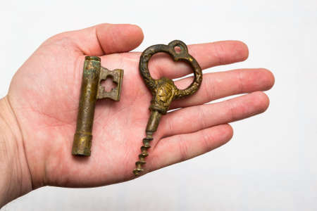Vintage bronze key with a built-in corkscrewの写真素材