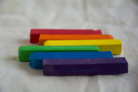 Blurred photo of the LGBT flag from the sticks of artistic pastel. Will serve as the background.の写真素材