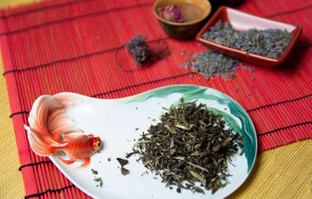 Green Chinese tea with lavender. Dried lavender flowers for tea. Tea mix.の写真素材