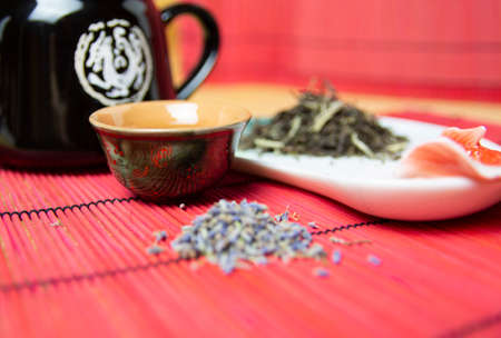 Green Chinese tea with lavender. Dried lavender flowers for tea. Tea mix.の写真素材