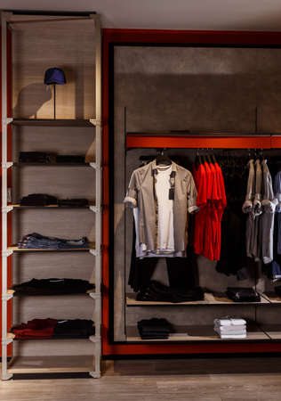 COLOMBO, SRI LANKA - SEPTEMBER 25, 2018: View of a Fashion Retail Store. T shirts, Trousers, Caps, Shoes with Shelves, Racks and Hangers, inside a Department Storeのeditorial素材