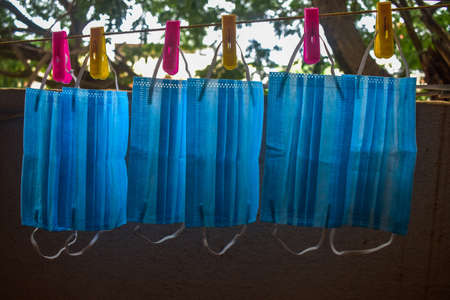 A bunch of blue masks background.