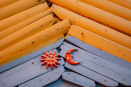 red and yellow painting on a wooden backgroundの写真素材