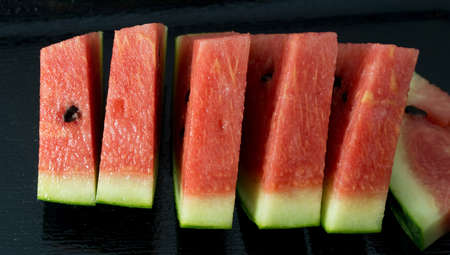Fresh Fruits, Close Up of Ripe and Sweet Refreshing Watermelon on A Black Plate.