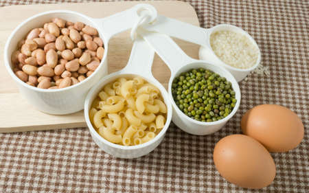 Food Ingredient, Pasta, Rice, Peanuts, Mung Beans and Egg High in Carbohydrate and Protein.の写真素材