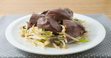 Chinese Traditional Food, Stir Fried Bean Sprout with Pig Blood Curd, Congealed Pork Blood or Pork...