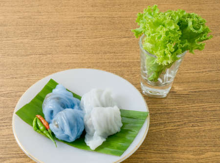 Thai Traditional Dessert, Steamed Rice Skin Dumplings Made From Glutinous Rice Filled with Minced Pork and Sweet Pickled Daikon Radish.の写真素材