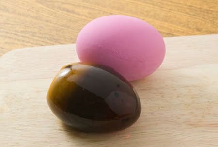 Asian Traditional Food, Two Century Egg or Pidan Made By Duck, Chicken or Quail Eggs in Mixture of Ash, Salt, Red Lime, Sodium Carbonate, Tea Leaves and Zinc Oxide.の写真素材