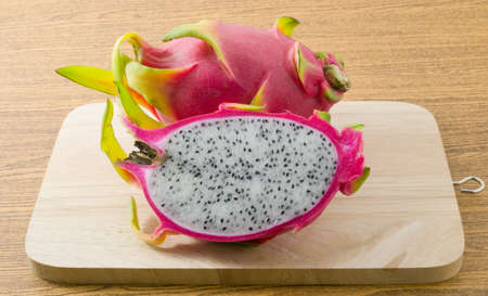 Fresh Fruits, Ripe and Sweet Dragon Fruit or Pitaya on Wooden Cutting Board.
