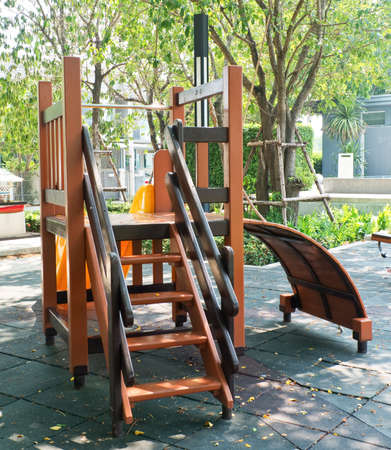 Children Playground, Slide and Rope Climber in Outdoor Park.