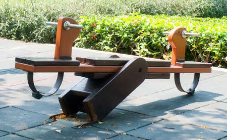 Children Playground, Broken Wooden Horse Seesaw in Outdoor Park.