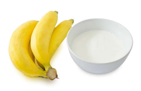 Bowl of Homemade Yoghurt with Ripe Banana, Nutritionally Rich in Protein, Calcium, Riboflavin, Vitamin B6 and Vitamin B12.の写真素材