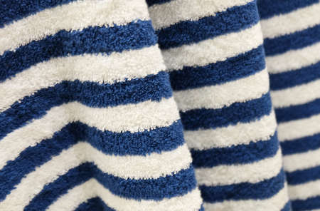 Fabric Texture, Close Up of White and Blue Cozy Bath Towel Texture. Selective Focus.の写真素材