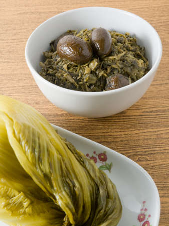 Chinese Traditional Food, Delicious Chopped Pickled Chinese Cabbage with Chinese Olives in A Bowl.の写真素材